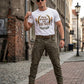 unwoke. - SHE/GER - T-Shirt