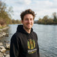 Binnerwear - Rehmigration dunkel Frontdruck - Unisex-Kapuzenpullover